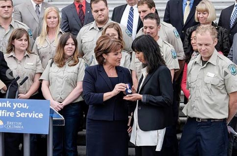 Kimiko Hawkes accepted the Medal of Good Citizenship from Premier Christy Clark on Oct. 6. The medal was awarded to her late fiancé John Phare posthumously by the Lieutenant Governor.   - Submitted Photo